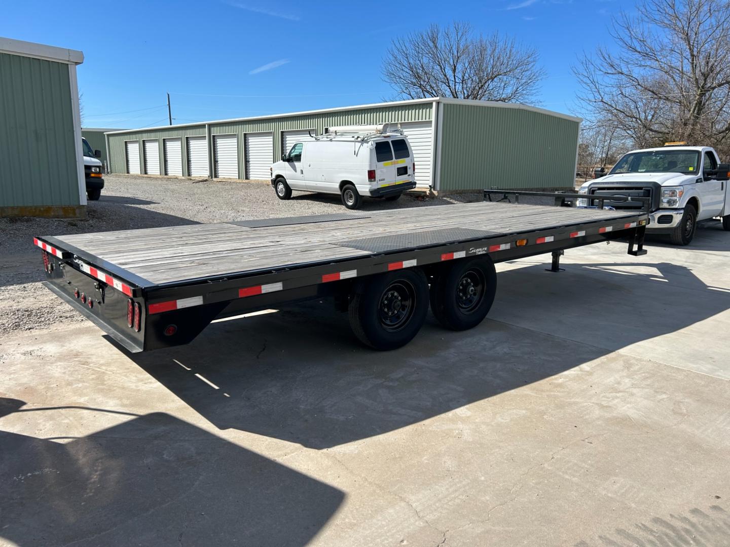 2022 BLACK EAST TEXAS TRAILER FLATBED (58SBF2021NE) , located at 17760 Hwy 62, Morris, OK, 74445, 35.609104, -95.877060 - 2022 EAST TEXAS TRAILER IS 20X8 FT. INCLUDES RAMPS DUAL AXLE GVWR 14,000 LB TITLE IN HAND $6,900 CALL RUSS OR JONA AT 918-733-4887 - Photo#2